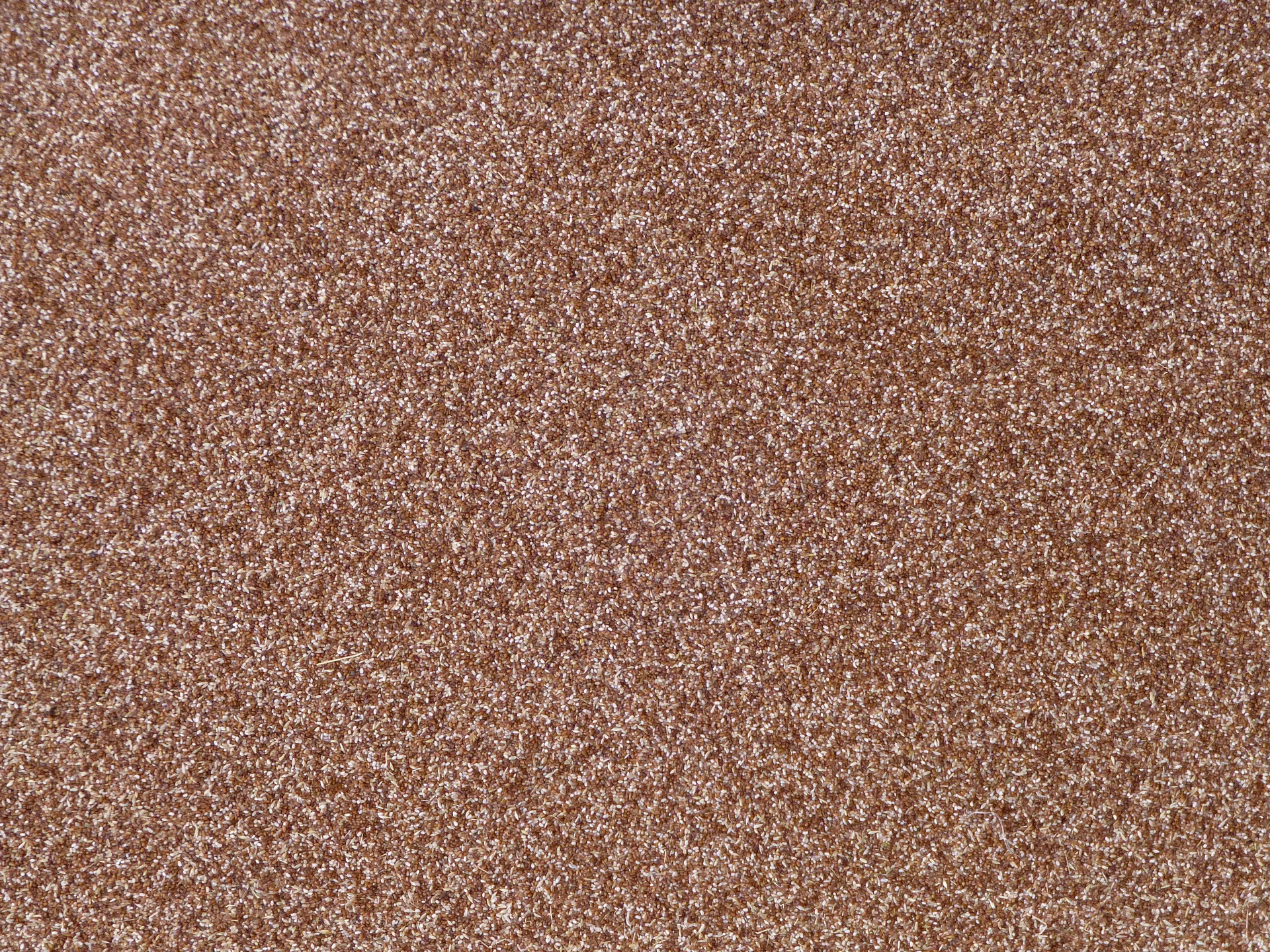 A heap of tiny brown teff grain at an Ethiopian market